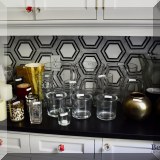 D29. Candleholders and vases. 